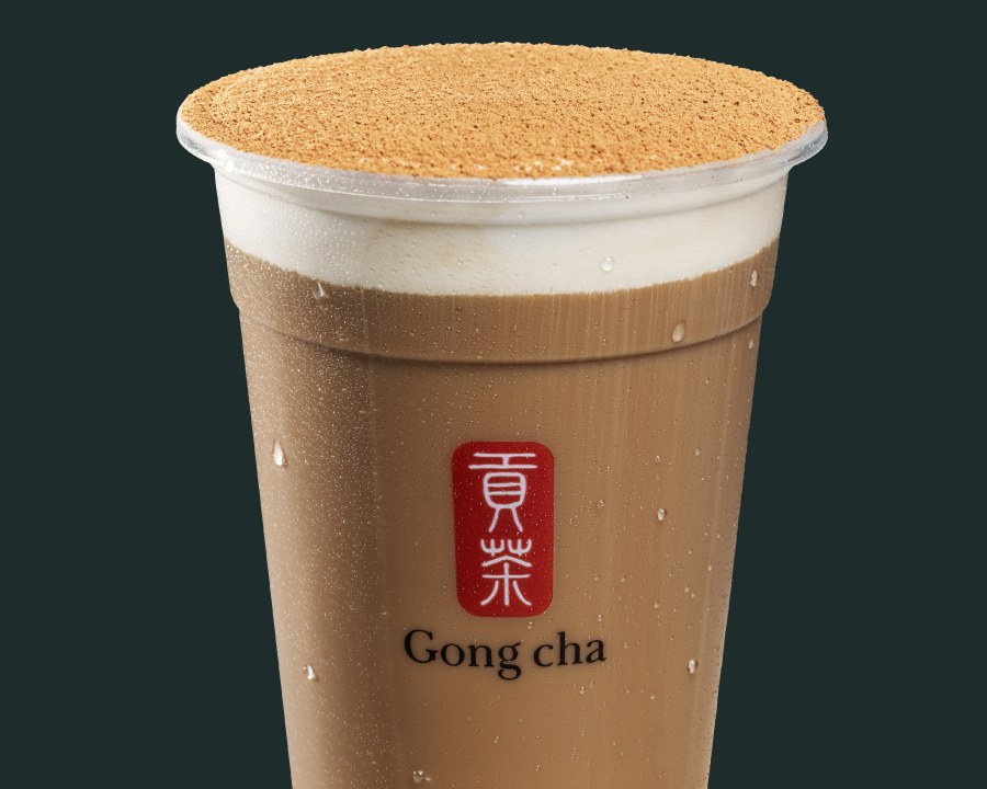 The Tea-ramisu Latte with Milk Foam in a Gong cha cup